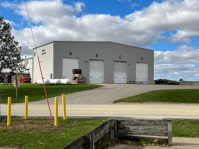 the RRC building with the public drop-off sign in front.